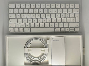 Unboxed Apple Magic Keyboard with sleek design, scissor-switch keys for premium typing and navigation experience